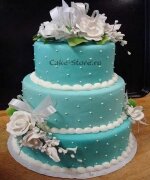 Бирюзовый свадебный торт и цветы