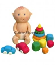 Фигурка на торт малыш с игрушками из мастики