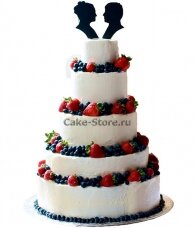 Многоярусный свадебный торт с фруктами и ягодами